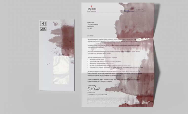 A letter with a wine spill on it