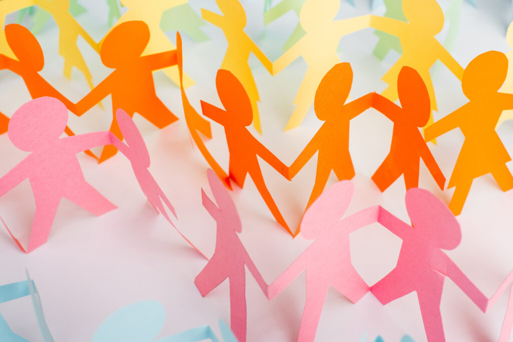 A paper chain of people