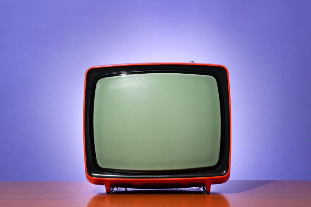 A retro TV on a blue background